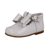 Andanines Girls Diamante Bow Buckle T- Bar Shoe in White Patent